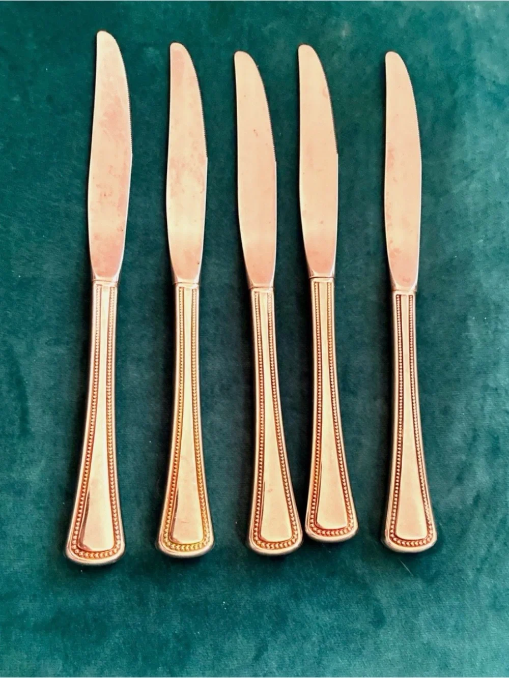 Set of 5 Oneida Stainless Needlepoint Dinner Knives
